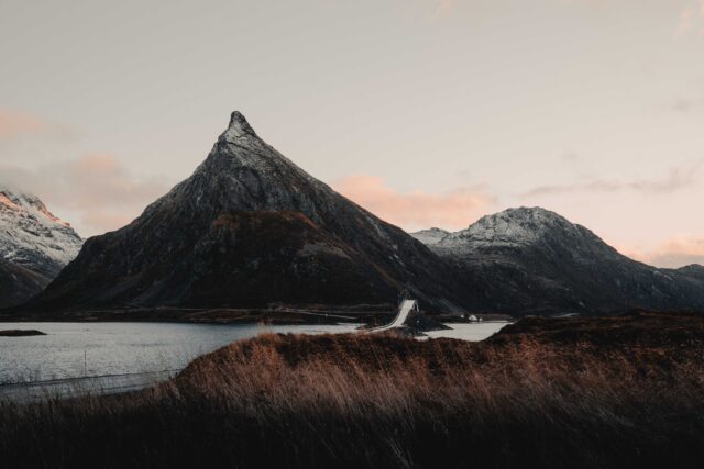 mountain near body of water