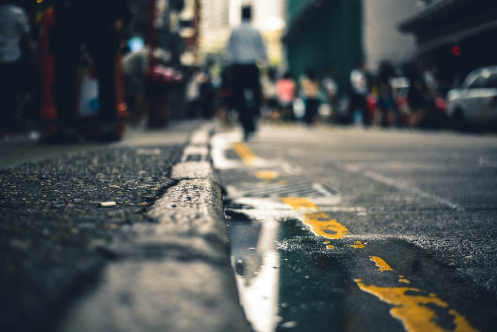 macro photography of water on road